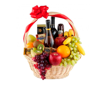 Basket of wine, fruit, and gourmet food